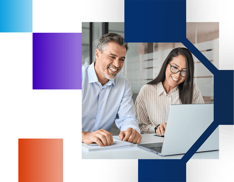 Woman and man working together on a laptop